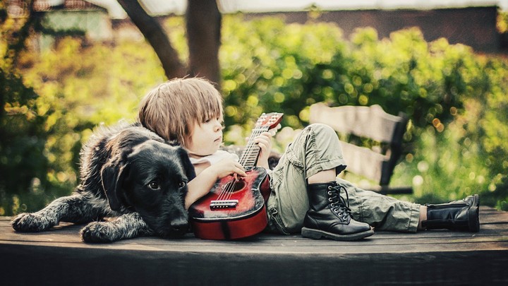boy playing guitar
