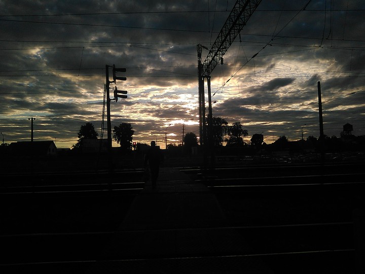 unusual clouds under railroad