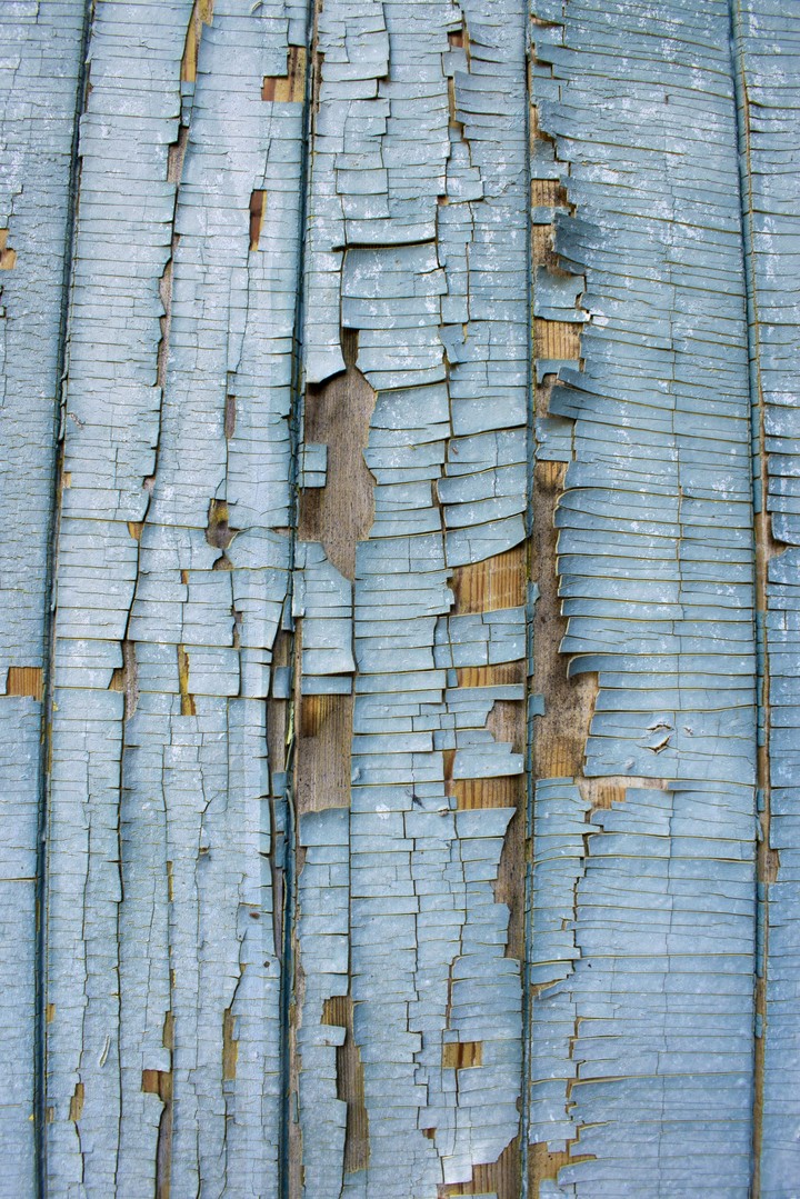 Blue cracked wooden wall