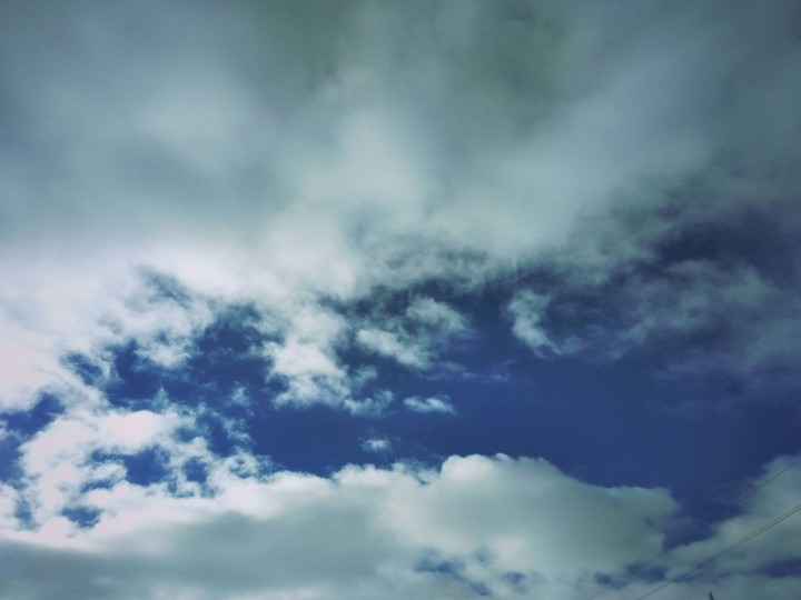 when you walk down the street look up and you'll see the sky