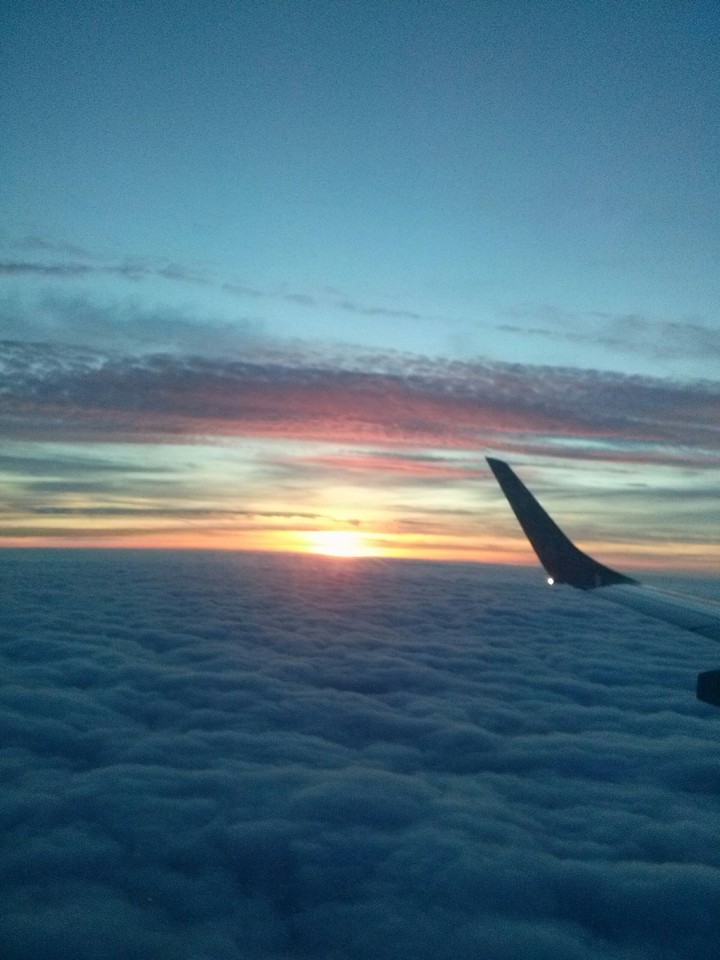 sunset over the cloudes
