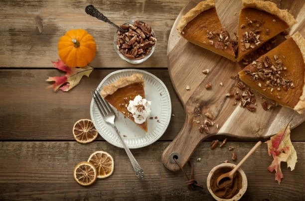pumpkin pie with pecans and spices