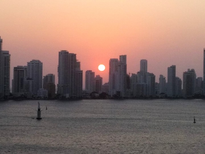 the sunrise above a city