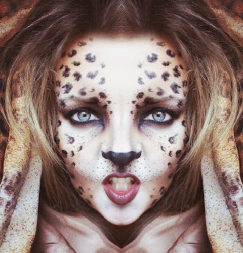 Leopard symmetric woman