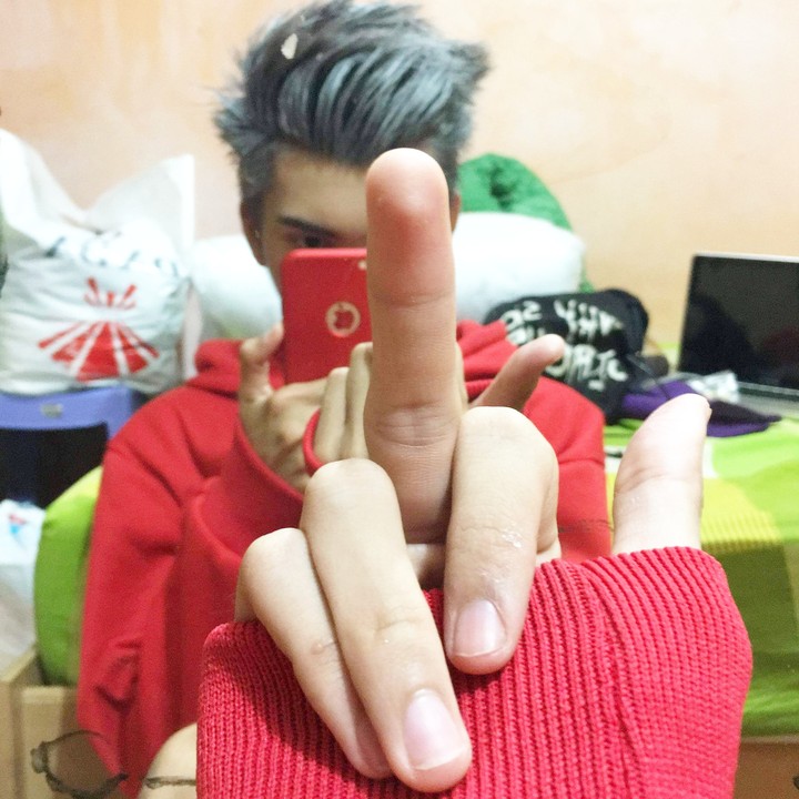 middle finger up