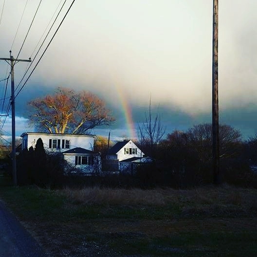 Rainbow and a Setting Sun