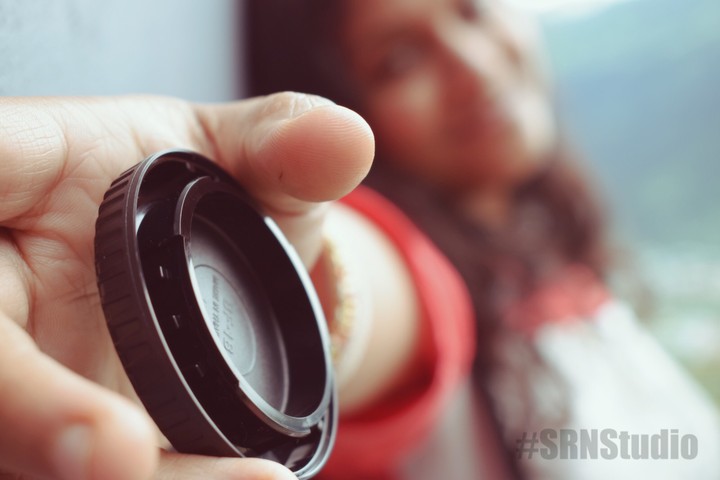 lens on girls hand