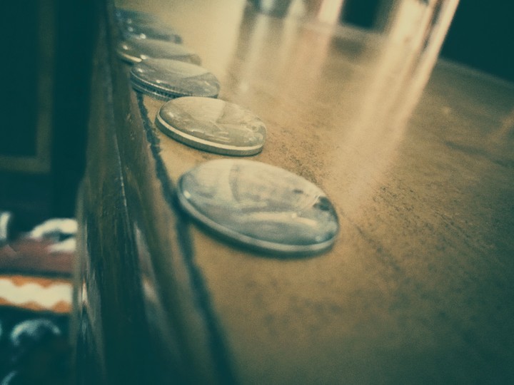 water floating on coins