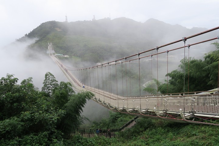 Suspension bridge in the clouds