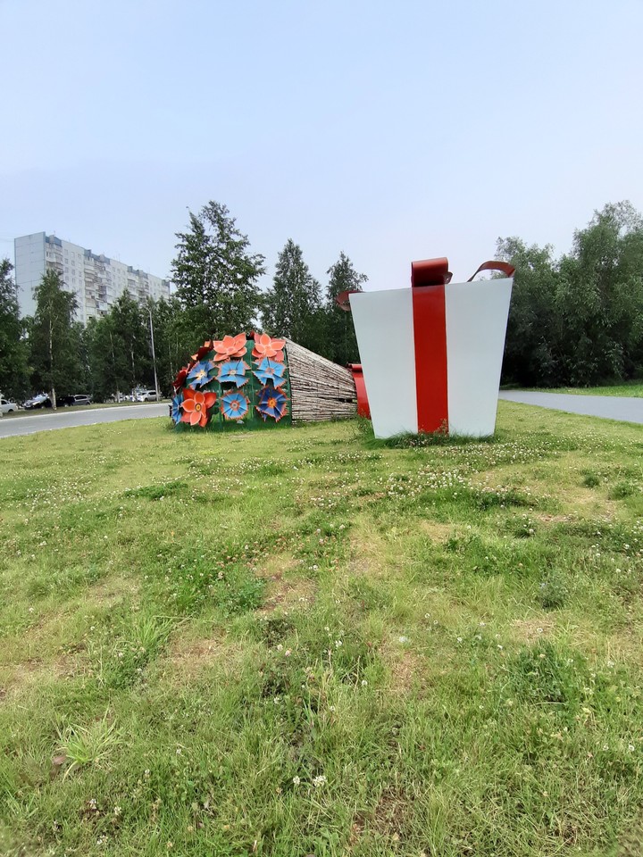 город