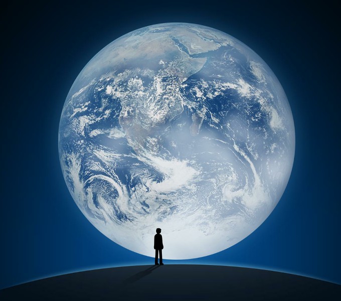 In front of  the moon
