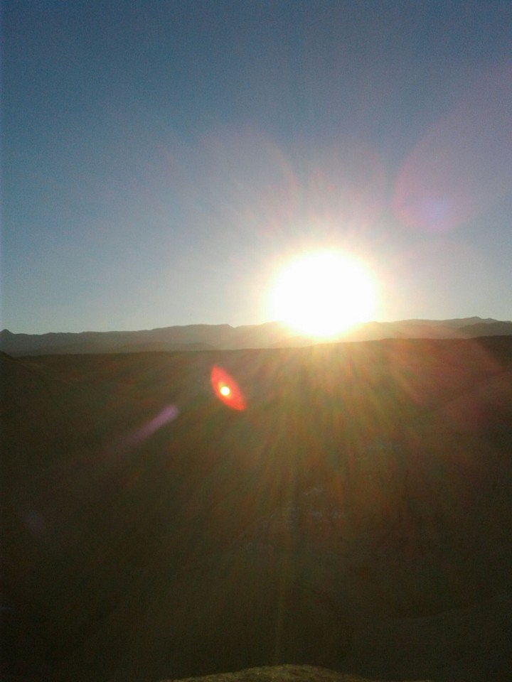 sun on desert mountains