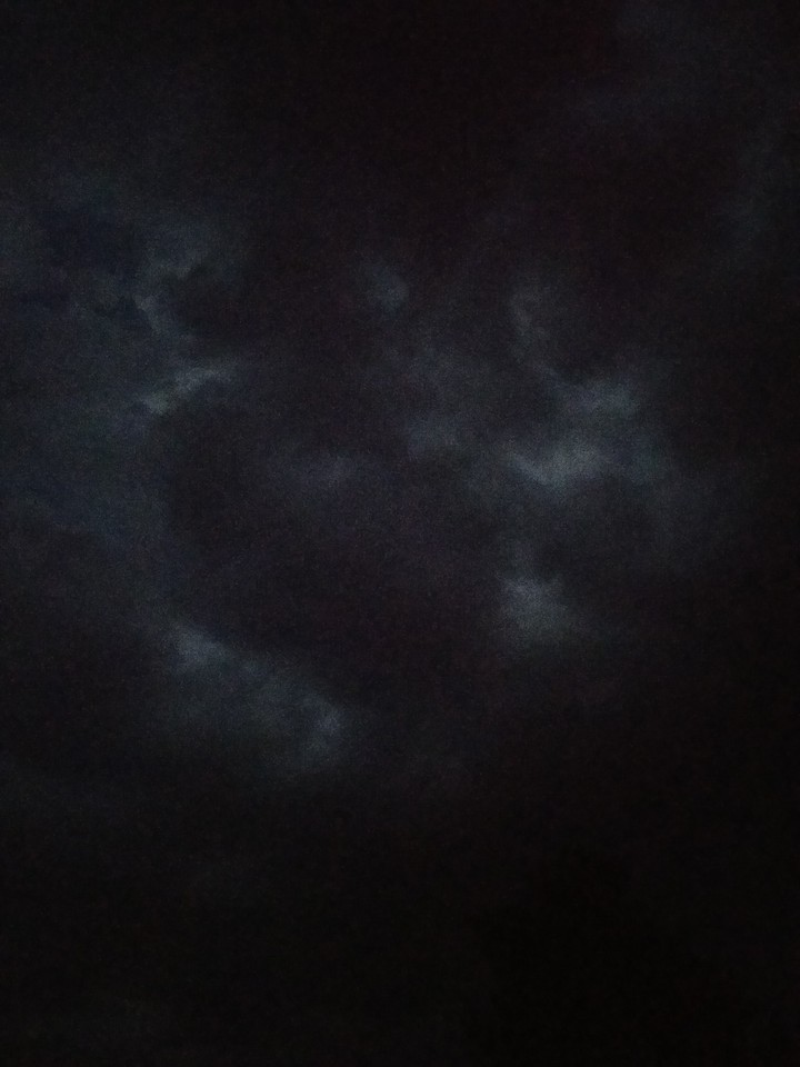 Where is the Moon? It's just hid behind some of the clouds.
