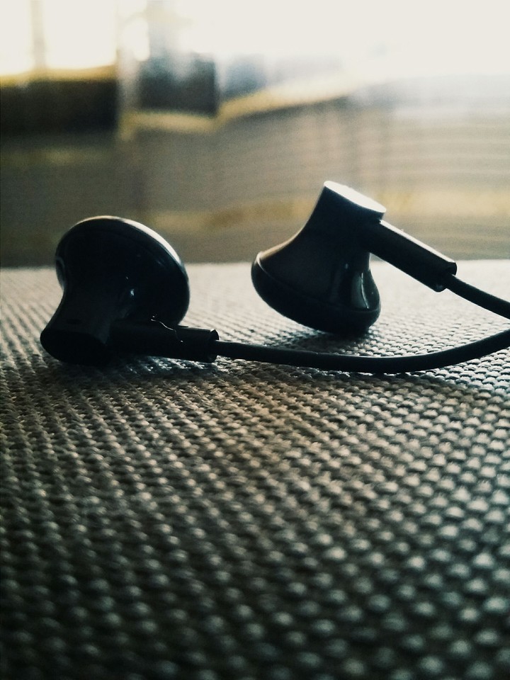 earphones on couch