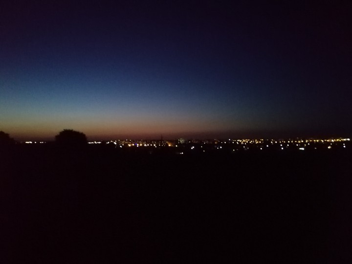 город