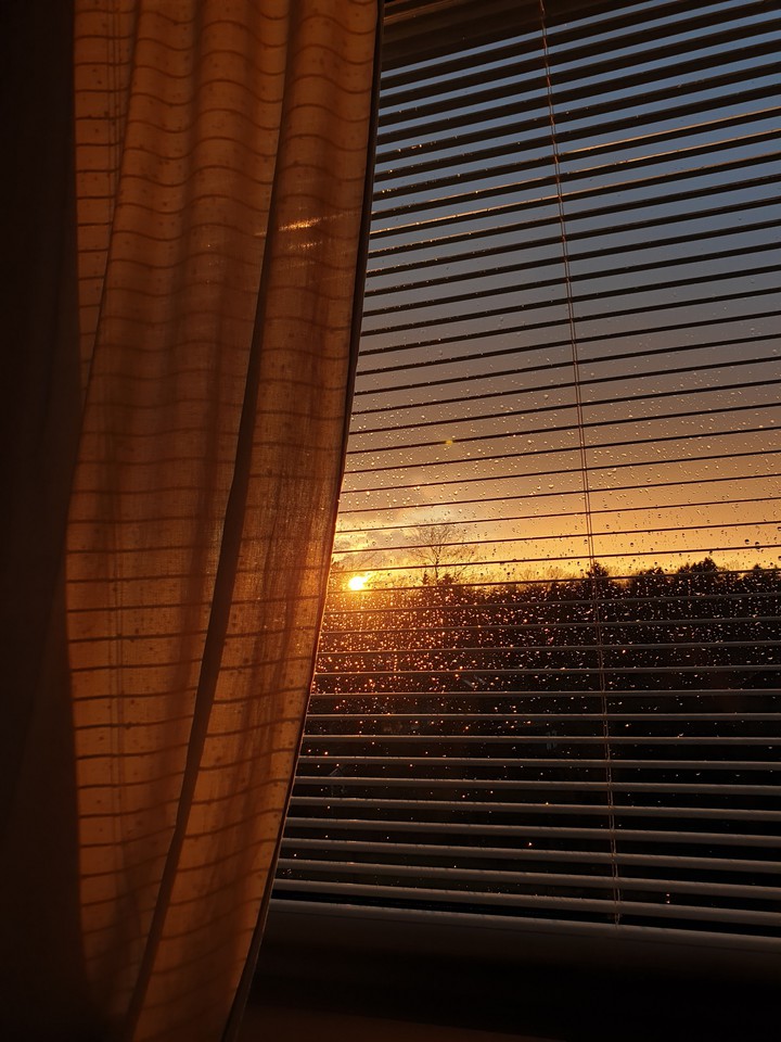 rainy sunset ..window