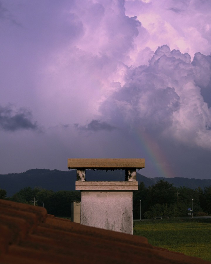 Purple sky with rainbow