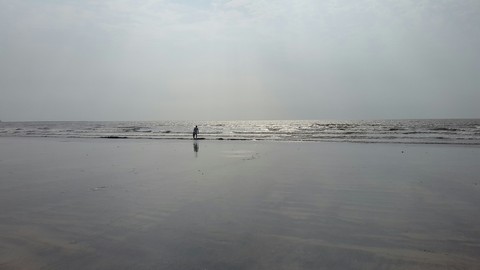 Father and Son play with the waves!