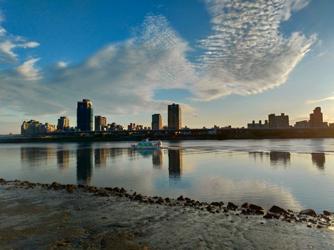 City reflection on the river.