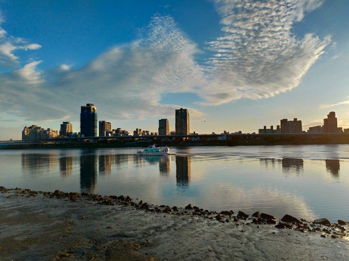 City reflection on the river.