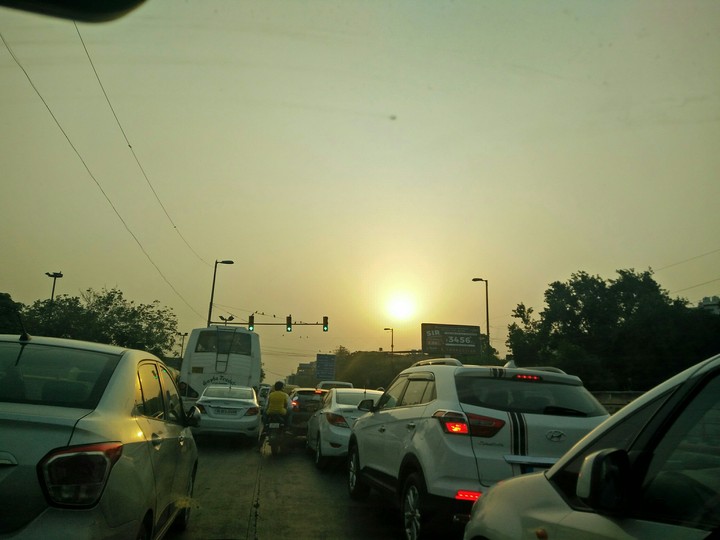busy roads with sun brightening your day..
