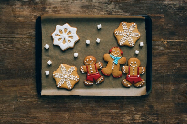 gingerbread kids playing in the snow