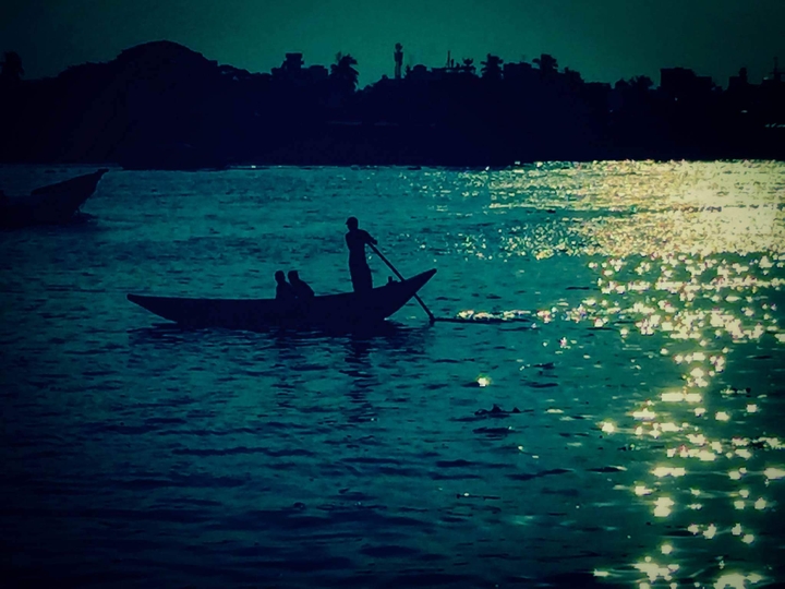 Boatman in Dark Water.. !