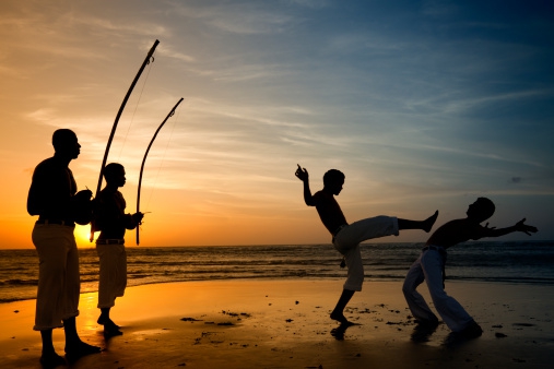 Capoeira mixes martial art, sport and music. Afro-brazilian