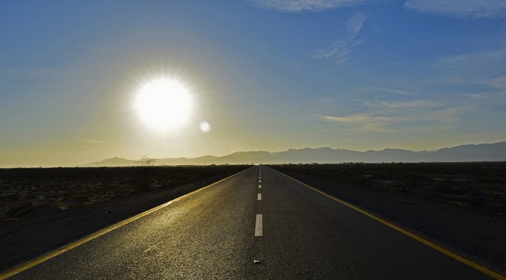 Sun and the lonely road