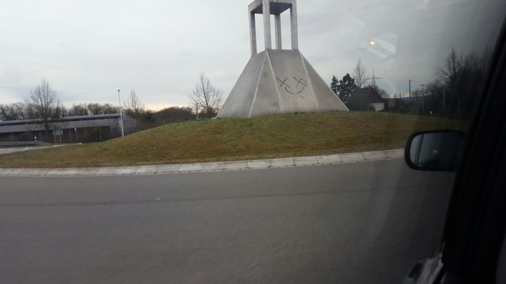 smiley on statue