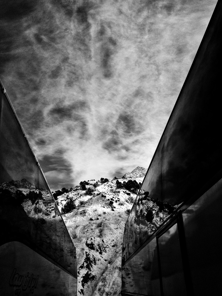 mountain between buses