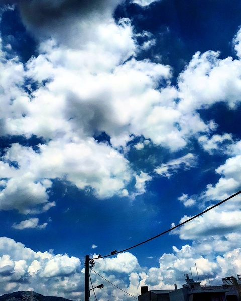 Above the rooftops.