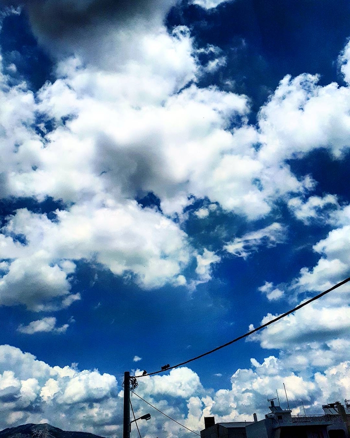 Above the rooftops.