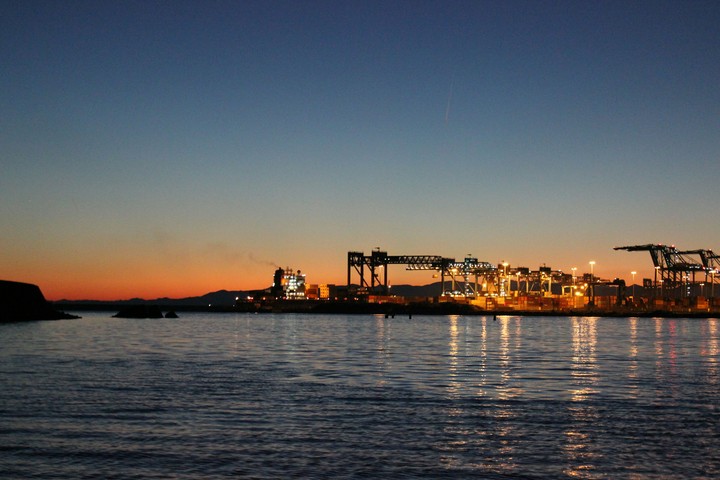sunset over the seaport