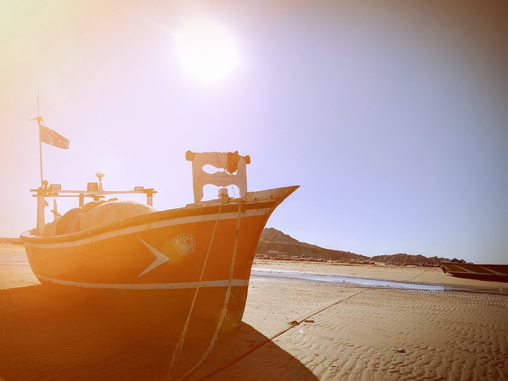 Boat and sun