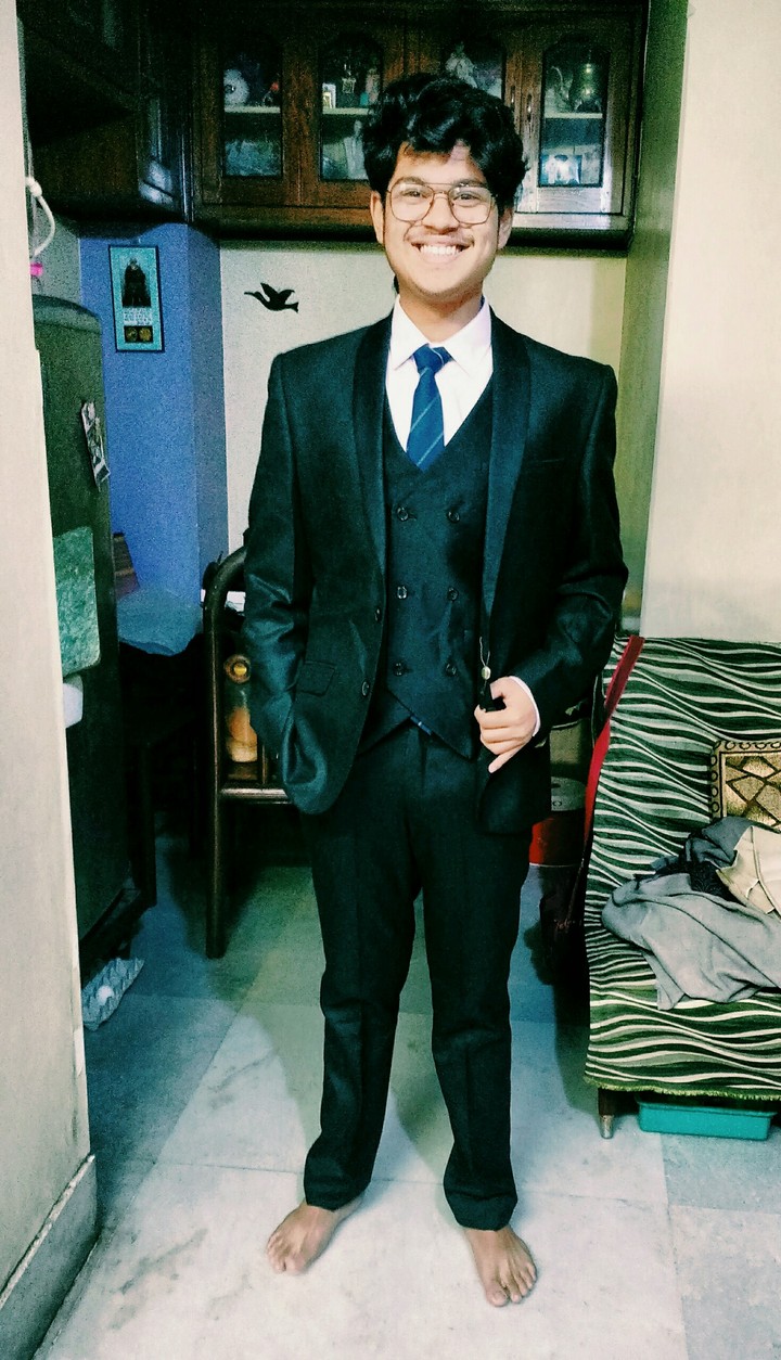 in full formal outfit
