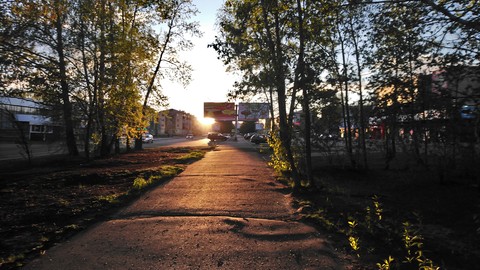 город