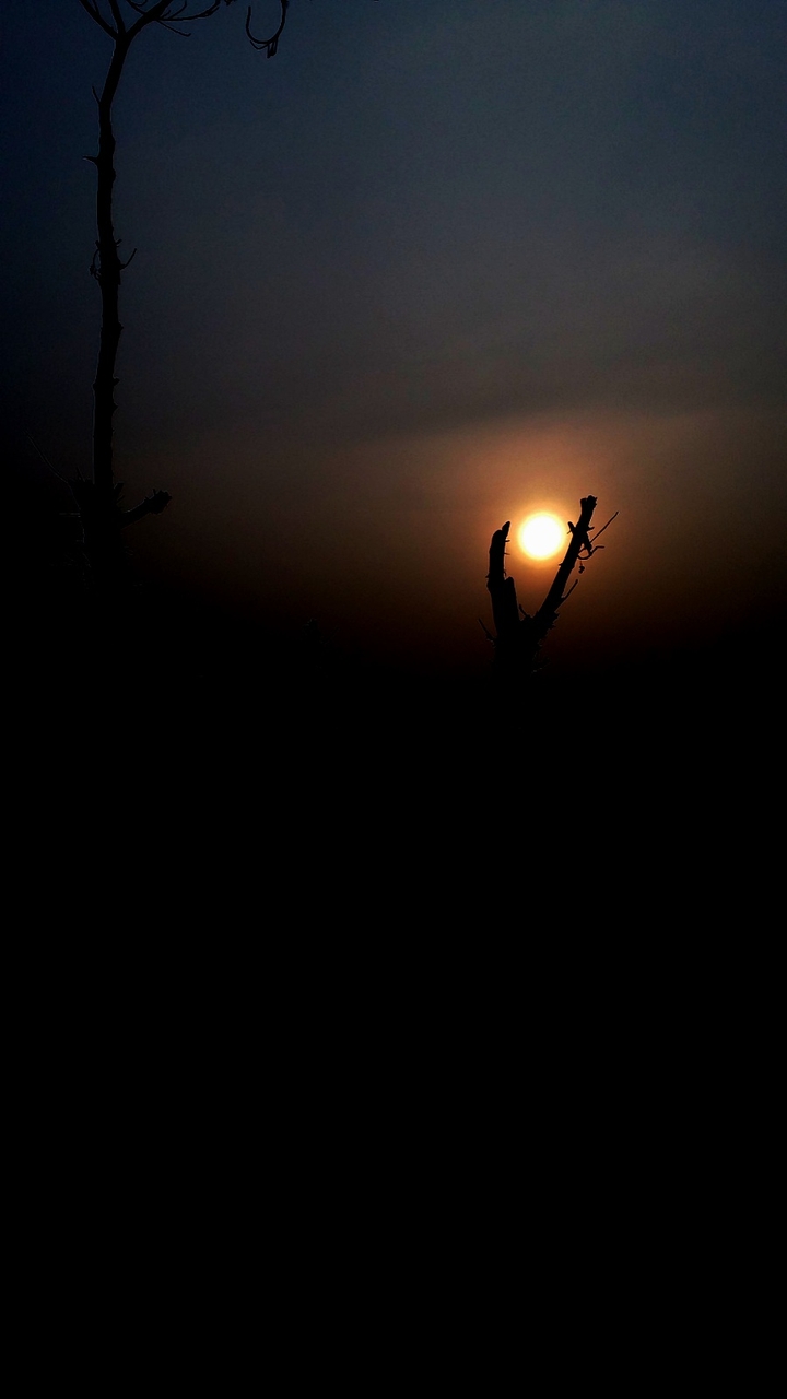 Emerging sun