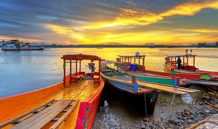 Boats like rainbow on a silent sea
