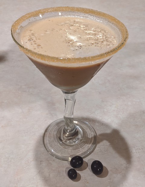 espresso martini with chocolate covered espresso beans, yum