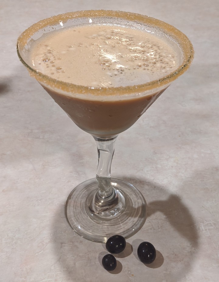espresso martini with chocolate covered espresso beans, yum