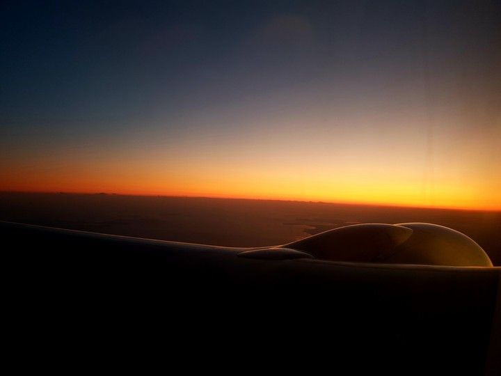 Airplane in sunset