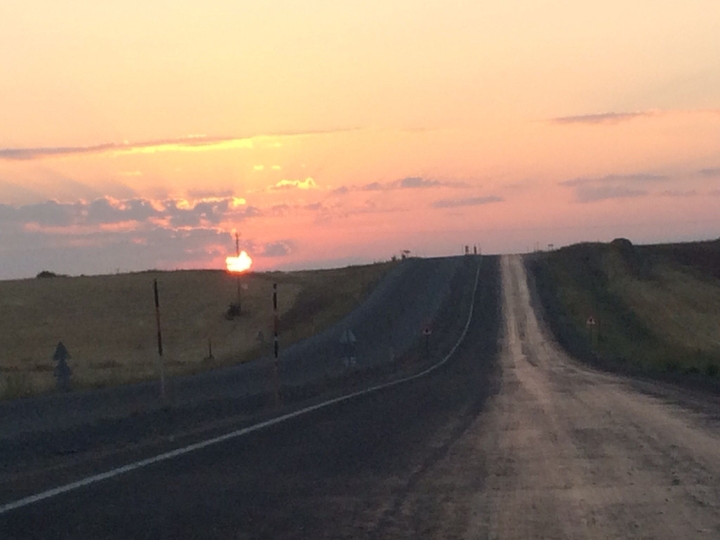 Rising sun with the endless road.