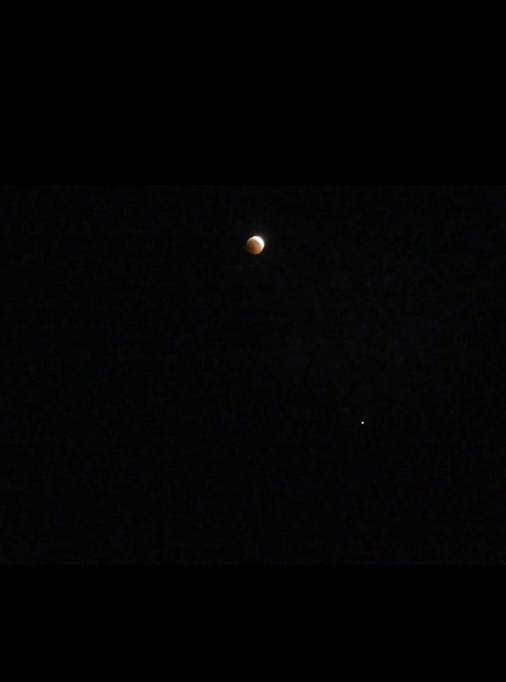 Moon eclipse with Mars aside