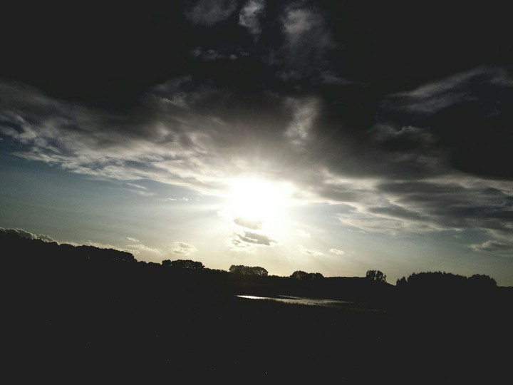 behind the clouds