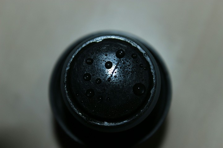 A planet in a bottle cap