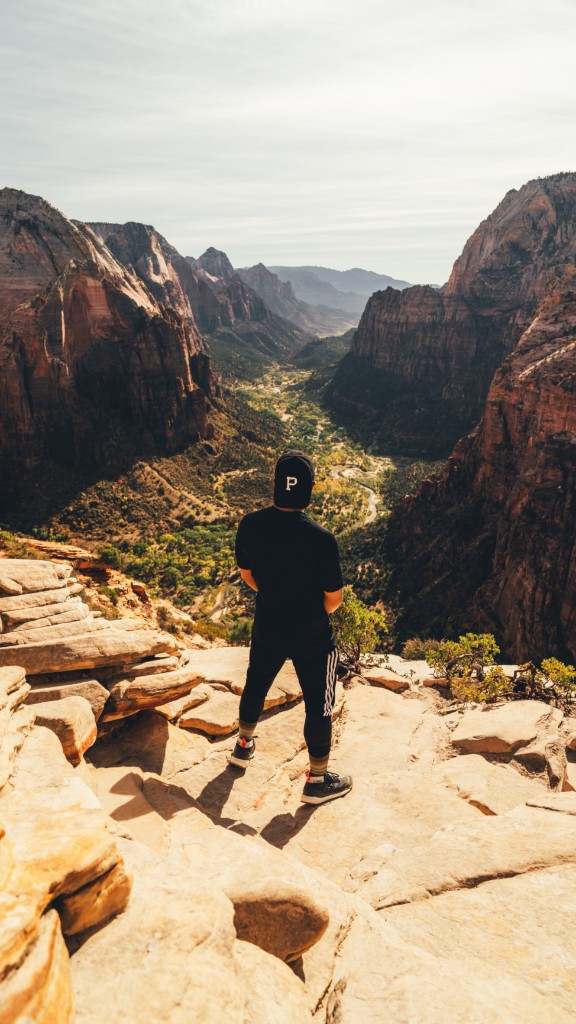 man looking from the hill
