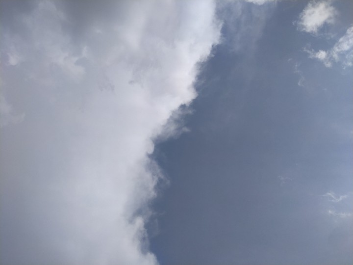 Half clouds half clear sky