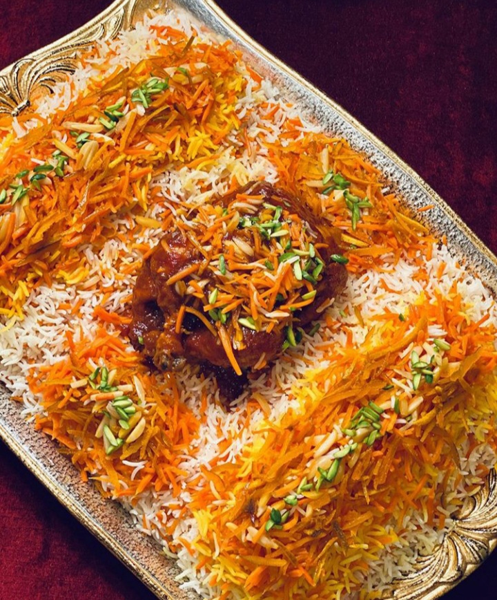 persian Jeweled carrot Rice with stuffed cornish Hen