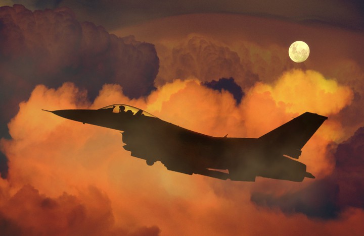 Fighter Craft Amidst The Clouds